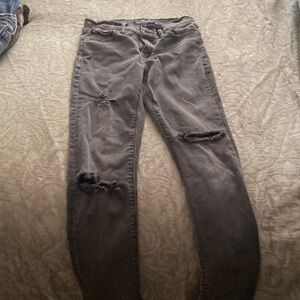 Gray/black distressed jeans lucky brand